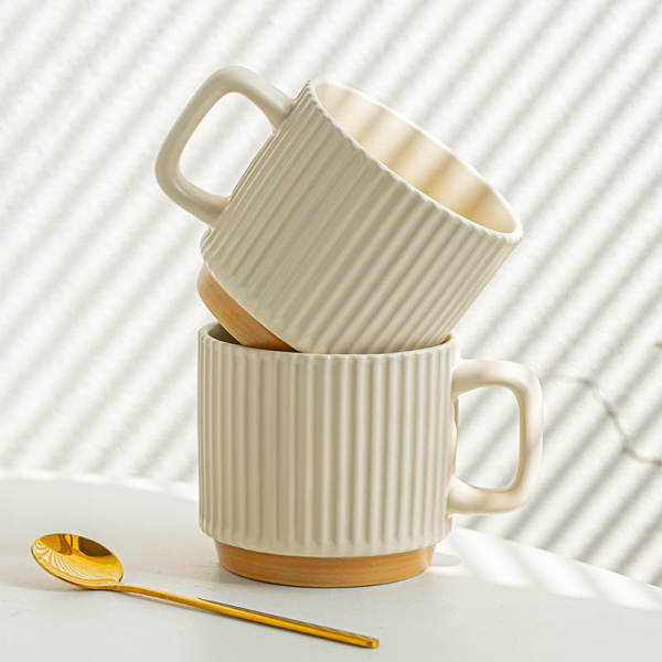 Handcrafted simple clay ceramic mug for drinking coffee at home