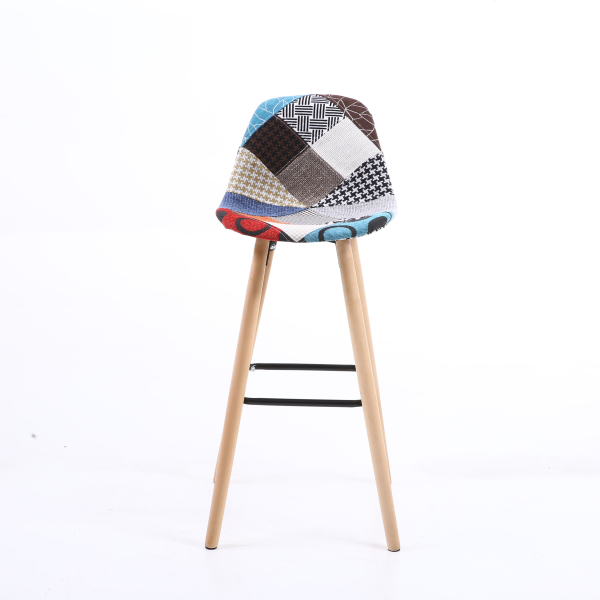 High-quality, modern patchwork bar stool with a wooden bar top and metal legs.